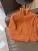 Abiti da lavoro Designer di cashmere Donna Gonna lavorata a maglia arancione Set Cardigan a maniche lunghe con cerniera a catena Diviso in 2 pezzi