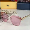 New Jewel Cat Eye Solglasögon lyx varumärkesdesigner Rimless Gradient Lens Temple med klassisk logotyp kvinnlig personlighet All-Match Glasses T152