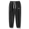 Pantaloni da uomo Taglie forti S~8XL Pantaloni casual Donna Uomo Fitness Abbigliamento sportivo Tuta Pantaloni sportivi in pile polare per streetwear Palestre Pantaloni da jogging 231011