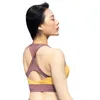 Traje de yoga Sujetador deportivo Mujeres Nylon Acolchado Cultivo Ropa interior a prueba de golpes Gimnasio Top Transpirable Empalme Fitness Running