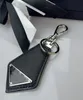 Nouveau Porte-clés Triangle Fob clé Anti-perte chaîne voiture clés étui pendentif décoratif Simple