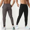 Luu Womens Men's Jogger Long Pants Sport Yoga Outfit Snabbt torrt dragkammar Fickfickor Sweatpants Byxor Mens Casual Elastic Absorbent and Breathable