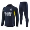 2023 Real Madrids Camisetas de Soccer Tracksuit Kit 23 24 Bellingham Vini Jr Rodrgo voetbaljack trainingspak Chandal Futbol Survetement Jogging Men and Kids