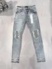 Designer da uomo Jean Pantaloni neri Pantaloni in denim Moda Casual Abito streetwear Pregevole fattura Pantaloni a gamba dritta slim a vita media Jeans viola Designer