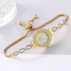 Orologi da polso Orologio da donna Moda Rotondo tempestato di diamanti Modello di carica Bracciale liberamente regolabile Lady Quartz