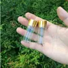 50 pz 10 ml Bottiglie di vetro Vite in alluminio Tappo dorato Vuoto Trasparente Liquido trasparente Contenitore regalo Bottiglia dei desideri Jarsgood qty Fahce