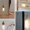 Nyhetsartiklar Motion Sensor Night Light Wall Sconces Smart Portable Wood USB Laddningsbar magnet för sovrums Hallväg Stairway 231017