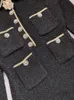 Designerjurk Franse zachte en elegante lange mouw parelknoop zwarte gebreide geplooide omwikkelde heupjurk