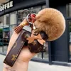 Keychains & Lanyards Designer keychain bear head leather fur ball pendant key chain bow car metal fashion personality creative cute OZOA XJVY