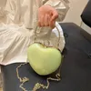 Вечерние сумки 2023 Карамельный цвет в форме сердца Тотализатор европейского бренда Дизайнерская роскошная вечеринка Свадебная сумка Модный клатч через плечо 231017