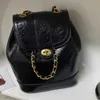 Mochila estilo sacos de ombro 2023 mulheres outono inverno mini cains mochila senhoras estudante cera leater soulder saco preto prata sólida mochilascatlin_fashion_bags