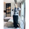 Tvådelad klänning Miyake veckad kostym för kvinnor Autumn Chinese Style Retro Fashion Printed Short Coat slits kjol Elegant Tvådelar Set 231018