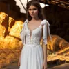 Modesto renda apliques com decote em v chiffon boho vestido de casamento elegante lado dividido sem mangas arco cintas praia vestidos de noiva