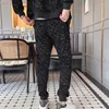 Tracki męskie Europejskie luksus Jacquard Flocking Tracksuit Men Spring Autumn 2 szt. Suit Paisley Designer Black Sportwear Ropa Deportiva