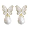 SINZRY splendida perla simulata zircone cubico farfalla fiore accessorio di gioielli alla moda orecchini pendenti per le donne 210624247D