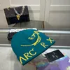 Chapéu de gorro de designer de luxo simples multicolor alto estiramento carta impressão casual ao ar livre cor sólida malha boné quente
