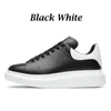 2023 Diseñador Zapatos casuales Hombres Mujeres Cómodo Versátil Viaje Cuero Cordones Zapatillas de deporte Moda Marca de lujo Triple Negro Blanco Zapatillas al aire libre