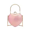 Вечерние сумки 2023 Карамельный цвет в форме сердца Тотализатор европейского бренда Дизайнерская роскошная вечеринка Свадебная сумка Модный клатч через плечо 231017