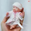 Bebekler Yeniden doğmuş bebek silikon bebek 12cm palmiye pijama elbise simülasyon oyuncakları 231017