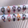 20 pezzi / scatola Anime Demon Slayer Set di braccialetti per bambini Stile casuale Braccialetti di cartone animato Gioielli per bambini F1211300d