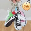 Creative Mini Canvas Shoes Keychain Women Cute Bag Hanging Sneaker Key Ring Car Key Holders Roliga presenter Tillbehör