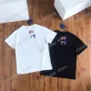 21SS Hommes T-shirts imprimés Polos Designer Étiquette rouge Lettres de couleur Manches Paris Vêtements Mens Shirt Tag Loose Style Noir White283f