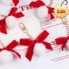 Lovely Big Red Bow Knot Keychain Pompom Hair Ball Ornaments Plush Bag Pendant Accessories Christmas Automotive Interior Gift