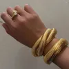 Bangle Fashion 18K Gold Plated Titanium Steel Armband Vintage Multilayers Elastic Gypsy Polering för kvinnor Estetiska smycken