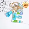 Creative Blue Little Daisy Dried Flower Keychain 26 Letters Butterfly Key Ring Women's Bag Tassel Pendant Car Key Holderare