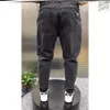 Sweats à capuche pour hommes Sweatshirts Printemps Eté Noir Bleu Cargo Jeans Hommes Streetwear Denim Jogger Pantalon Baggy Harem Jean Pantalon 231018