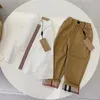 Diseñador Camisa y pantalones de manga larga Conjunto de 2 piezas Nuevo primavera y otoño Marca de alta calidad Tide Fan de ropa para niños Tamaño de ropa de 100 cm-150cm A03