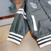 Diseñador de lujo Niños Abrigos con cremallera Moda Chaqueta para niños Tamaño 100-150 CM Insignia bordada decoración Bebé uniforme de béisbol Aug30