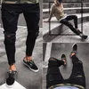 Pantaloni da uomo con zip Jeans skinny neri Designer maschile Jeans strappati in denim Casual in cotone elasticizzato da uomo Slim Fit High Street per Uomo316d