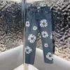 Jeans da uomo con stampa floreale giacca di jeans slim streetwear cowboy jeans pantaloni fidanzato impilati ragazze da donna larghi a vita alta