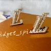 Boucles d'oreilles lettres V de créateur de mode clous de diamant pour femmes avec boîte-cadeau et sac à poussière