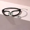 Braccialetti con ciondoli Colore argento sterling Doppi anelli rotanti Corda per gli amanti Coppia Catena a mano Gioielleria di moda originale