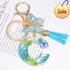 Creative Blue Little Daisy Dried Flower Keychain 26 Letters Butterfly Key Ring Women's Bag Tassel Pendant Car Key Holderare