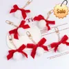 Lovely Big Red Bow Knot Keychain Pompom Hair Ball Ornaments Plush Bag Pendant Accessories Christmas Automotive Interior Gift