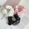 Diseñador de lujo Carta Bandas de goma para el cabello Anillo para el cabello Triángulo invertido Brandd Estilo elegante para encanto Mujeres Niñas Joyería para el cabello Accesorio para el cabello Alta calidad