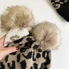 Winter Adult Leopard Pattern Jacquard Knitted Hat Personalized Wool Ball Warm Hat Women's Fashion Versatile Round Top Beaded Wool Hat Ear Protector