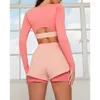 Set attivi 2 pezzi Set da yoga Tute sexy Manica lunga con corsetto ritagliato Top con cerniera Pantaloncini a vita alta Abbigliamento sportivo aderente