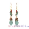 Boucles d'oreilles pendantes vert Jade Magnolia cadeau femmes accessoires amulettes bijoux chinois 925 argent Designer véritable charme pierre précieuse naturelle