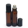 Mini rolo portátil de 5ml 1/6oz em garrafa de vidro fragrância perfume âmbar marrom garrafas de vidro grossas óleo essencial rolo de metal de aço