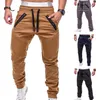 Pantaloni skinny casual da uomo Pantaloni sportivi con zip e coulisse di alta moda Tasche allacciate alla caviglia Pantaloni lunghi Pantaloni sportivi Pantaloni cargo Abbigliamento211I