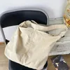 Plunjezakken Witte lichtgewicht en duurzame dames canvas handtas met grote capaciteit Stijlvolle stoffen schoudertas Vrouwelijke handtassen