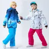 Trench da donna Tuta da sci per bambini Snowboard per bambini Neve calda Abbigliamento da esterno Ragazzo Ragazza Cappotto con cinturino Pantaloni Abbigliamento da sci