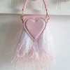 Bolsos de noche de lujo con plumas de avestruz reales, bolso de mano para mujer, bolso de mano con forma de corazón de melocotón para mujer, bolso de mano para fiesta 231019