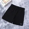 Shorts pour hommes marque de mode décontracté couleur unie séchage rapide Vintage Cargo pantalon mâle lâche taille élastique longueur au genou