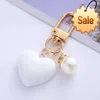 Black White Frosted Heart Keychain with Pearl Charms Trendy Headphone Case Bag Ornaments for Couples Friendship Gift Accessories