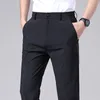 Pantaloni da uomo 2023 Estate Casual Uomo Sottile Business Stretch Slim Elastico in vita Jogger Coreano Classico Nero Grigio Blu Pantaloni maschili 231018